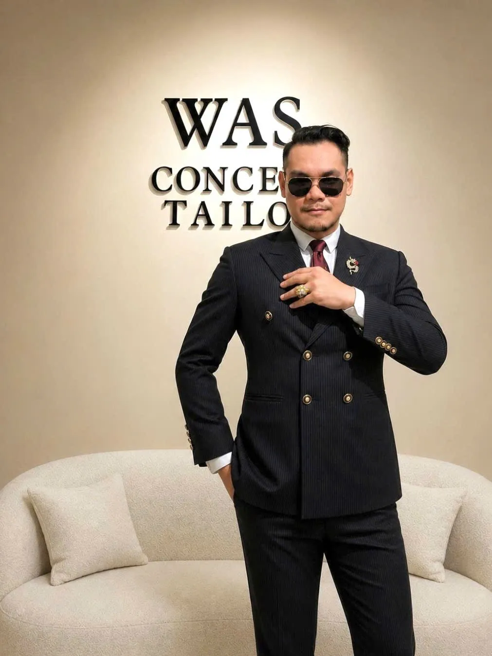 Founder of WAS Concept Tailor in a bespoke black suit at the Saigon showroom